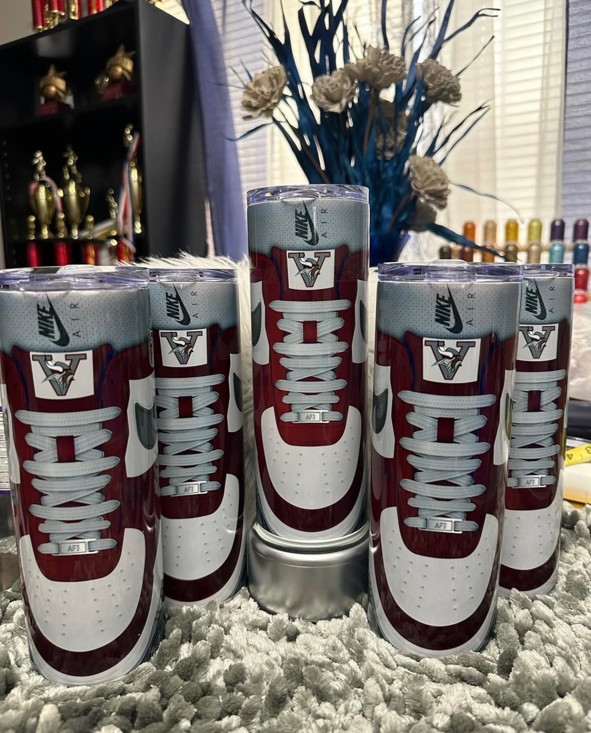 Custom maroon football-style tumblers